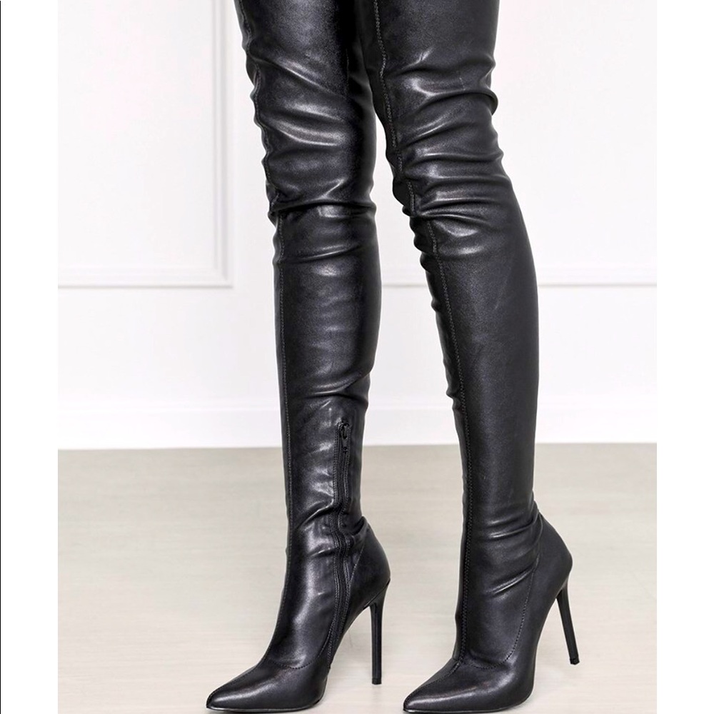 Thigh high new in box size 10